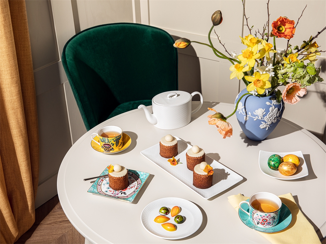 Easter table setting with colours and white teaware
